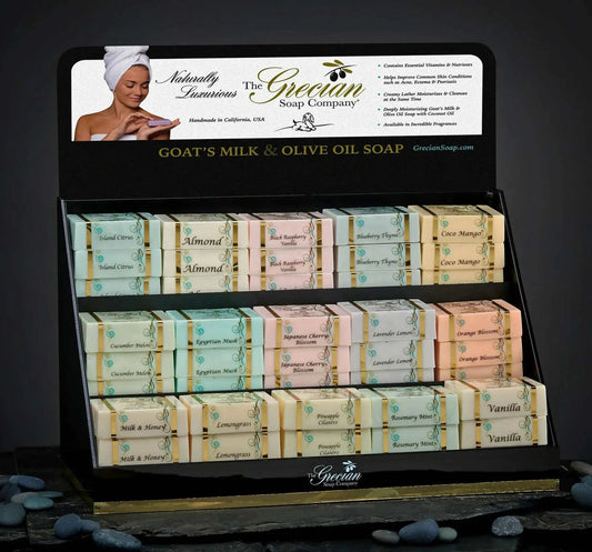 Goats milk and olive oil soap display with assorted fragrances.