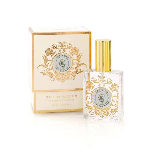 Les Bois Large Perfume 60 mL bottle with elegant gold design, featuring bergamot, cucumber, violet, amber woods, and patchouli notes.