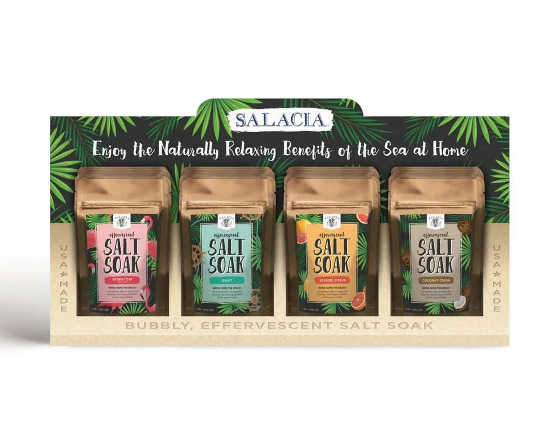 Effervescent salt soaks with point of purchase display featuring 8 pouches in Seaside Citrus, Lemon Lavender, Drift, and Coconut Crush scents.