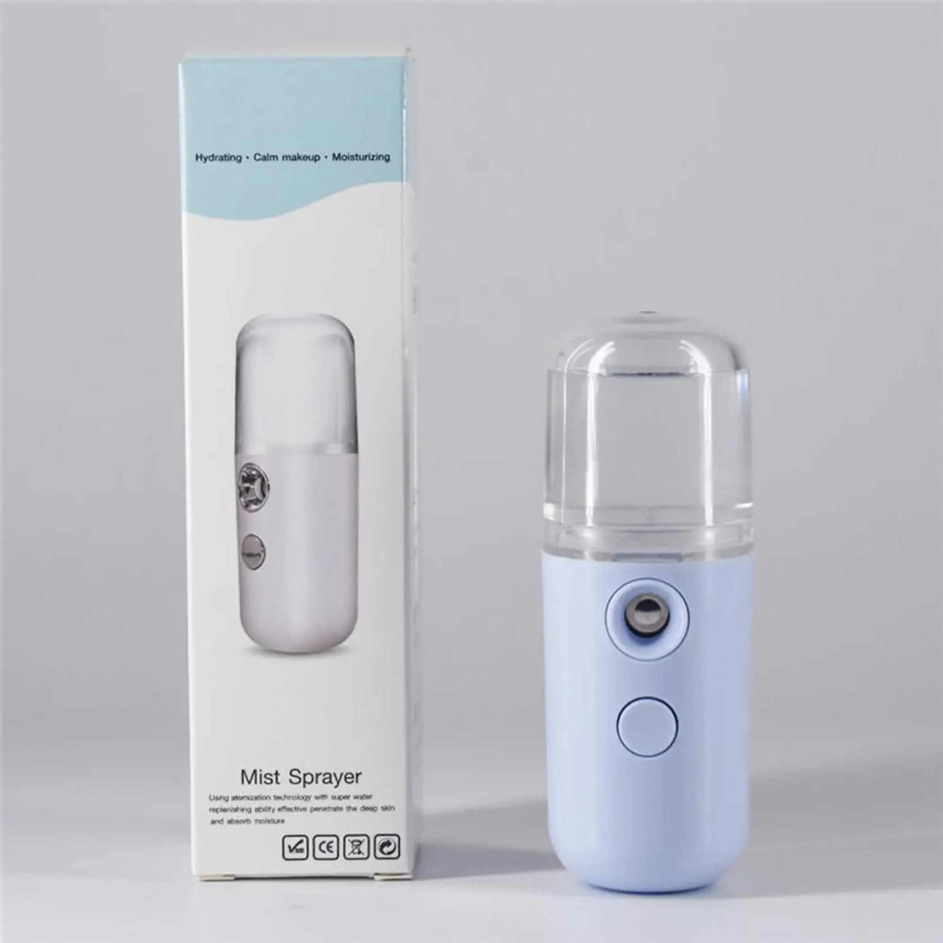 Compact blue Nano Mist Sprayer for skincare, featuring fine mist, portable size, and ultrasonic technology.