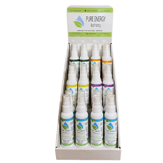 Sanitizing spray travel size display with moisturizing formula, featuring assorted scents including lavender, satsuma, lemon, peppermint, and unscented.