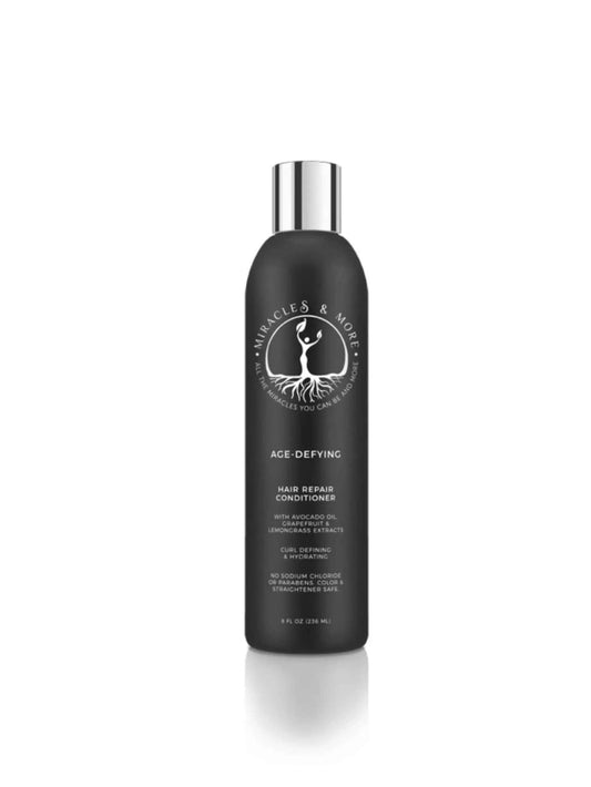 Age-Defying Hair Repair Conditioner bottle with hydrating and frizz-reducing botanical extracts for all curl types.